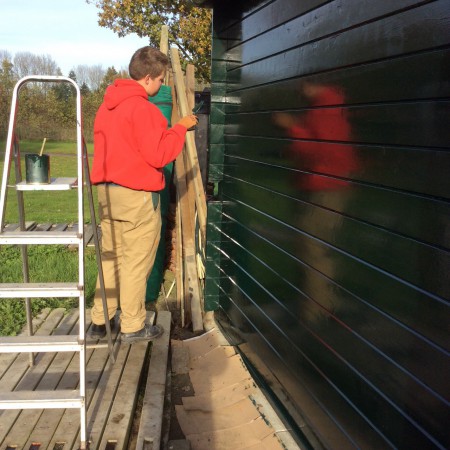 Willian is de blokhut aan het schilderen